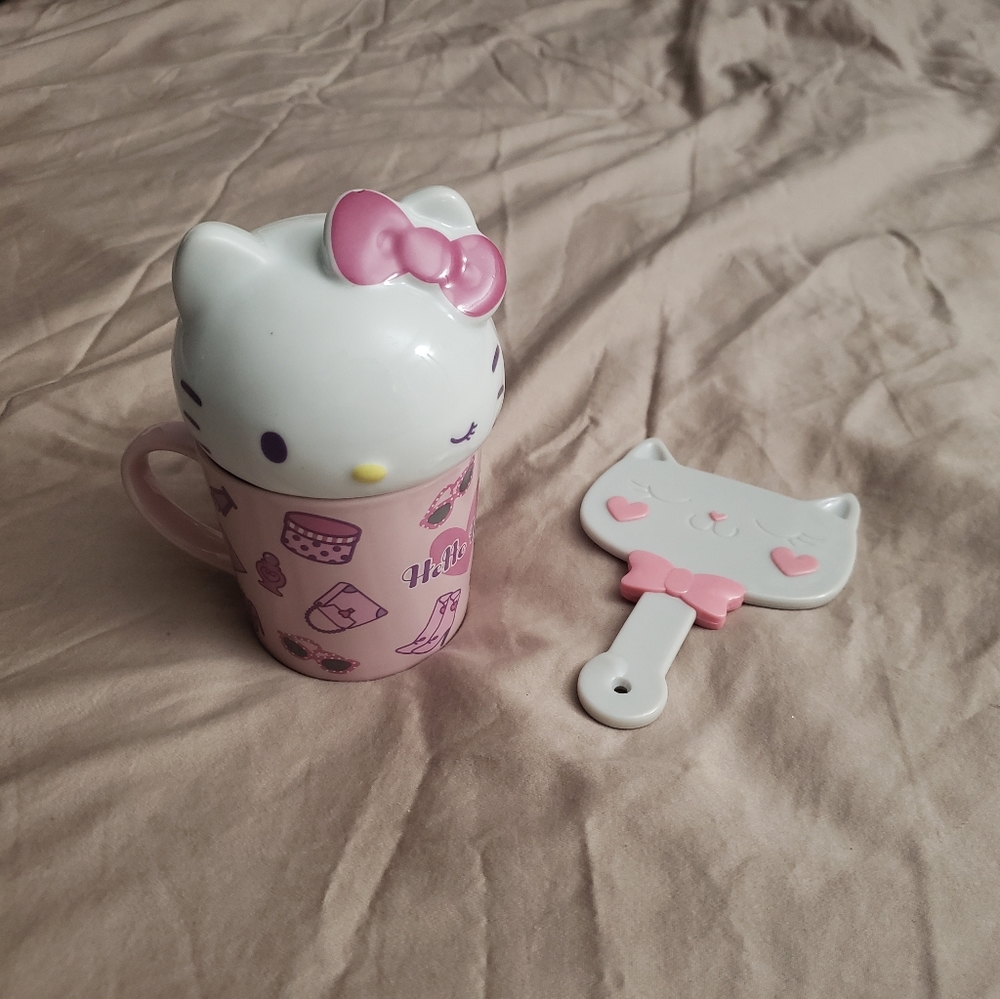 Hello kitty mug and cat mirror